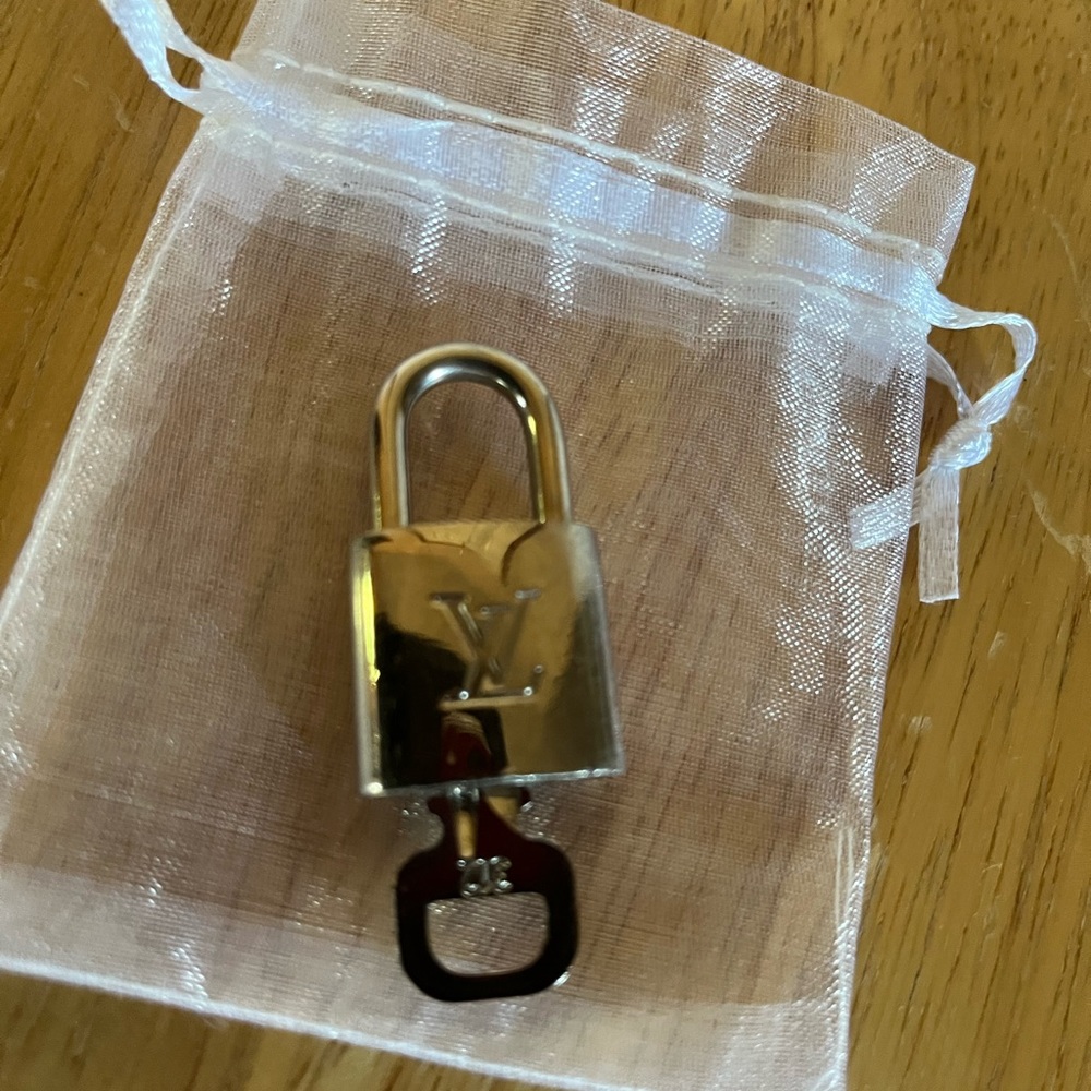 EUC Louis Vuitton authentic silver lock and key